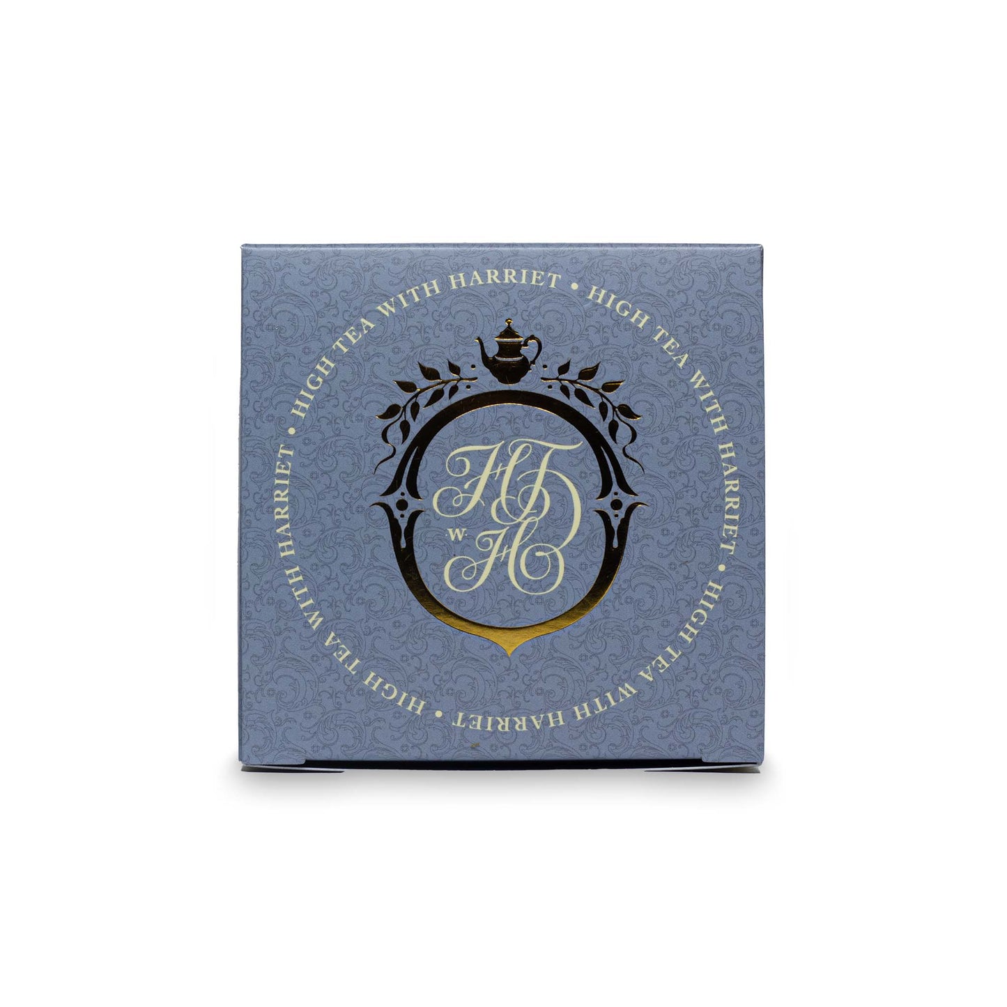 Top view of High Tea with Harriet Earl Grey box in classic blue with monogrammed crest