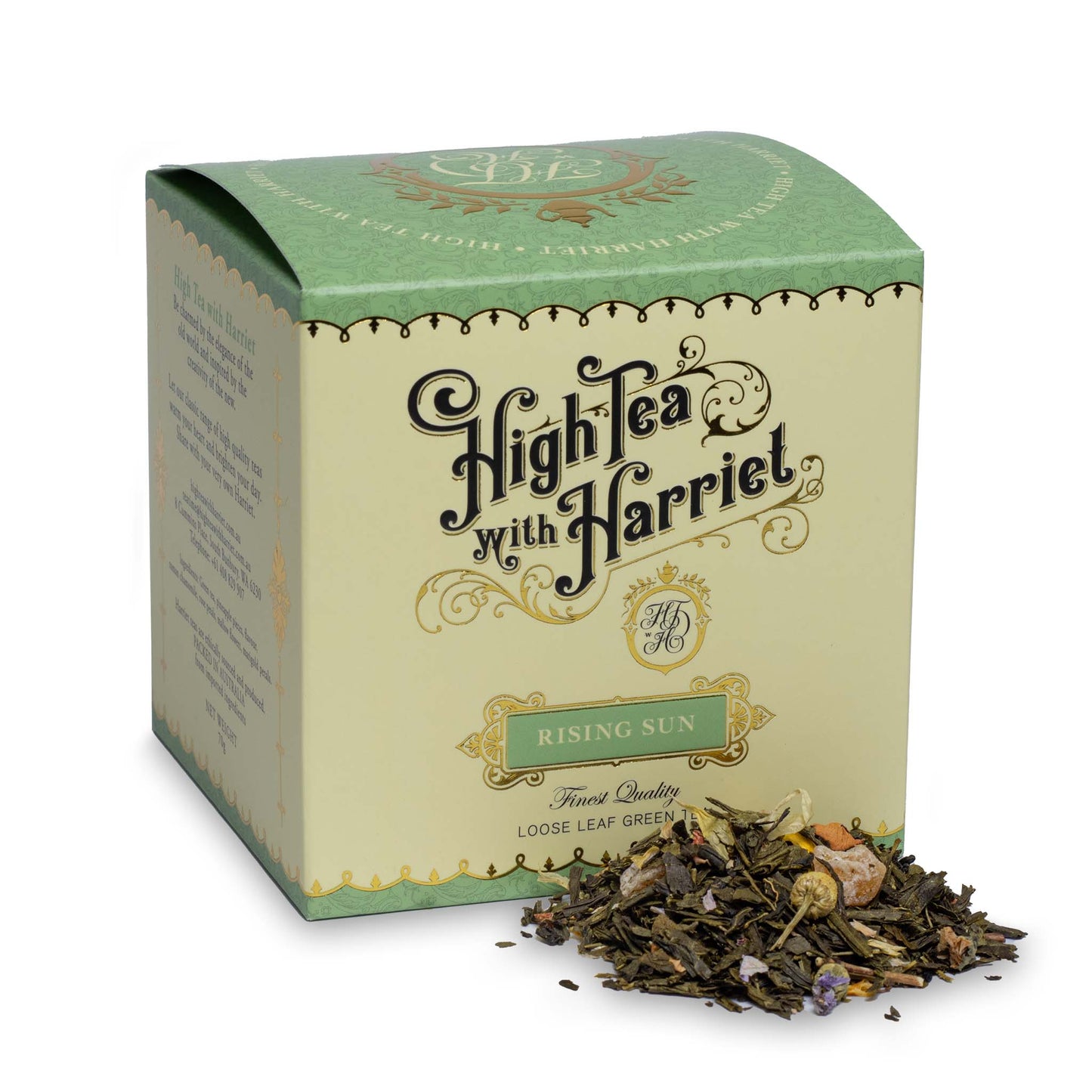 High Tea with Harriet Rising Sun tea in pale green and cream box with loose leaf green tea in front featuring pineapple, petals, and chamomile