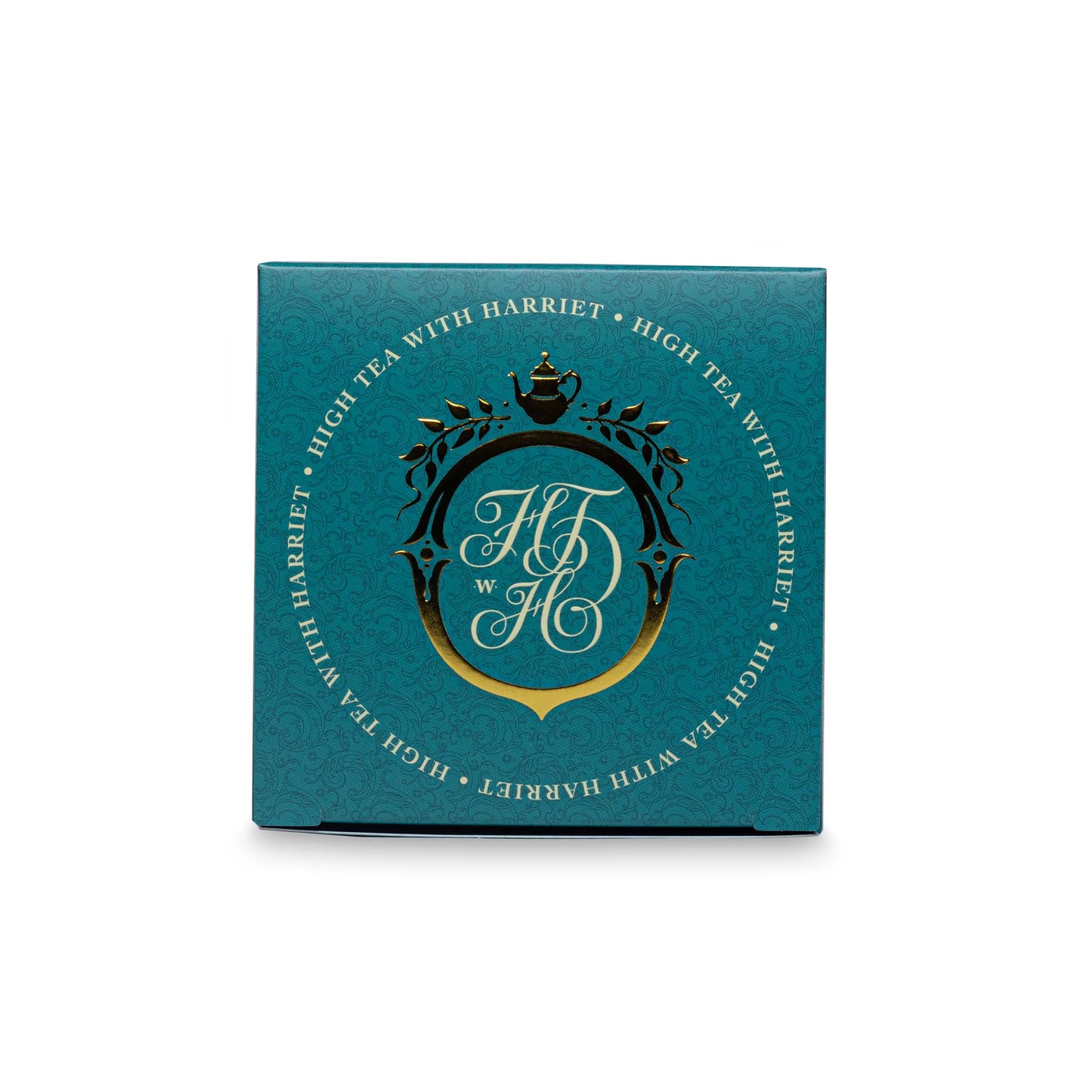 Top view of High Tea with Harriet Sunday Tea box in rich teal with crest logo