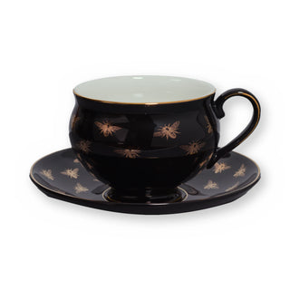 Fine bone china teacup, Black Bee design, on its saucer