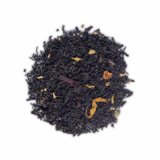 Loose leaf French Earl Grey tea with black tea leaves and petals on white background by High Tea with Harriet