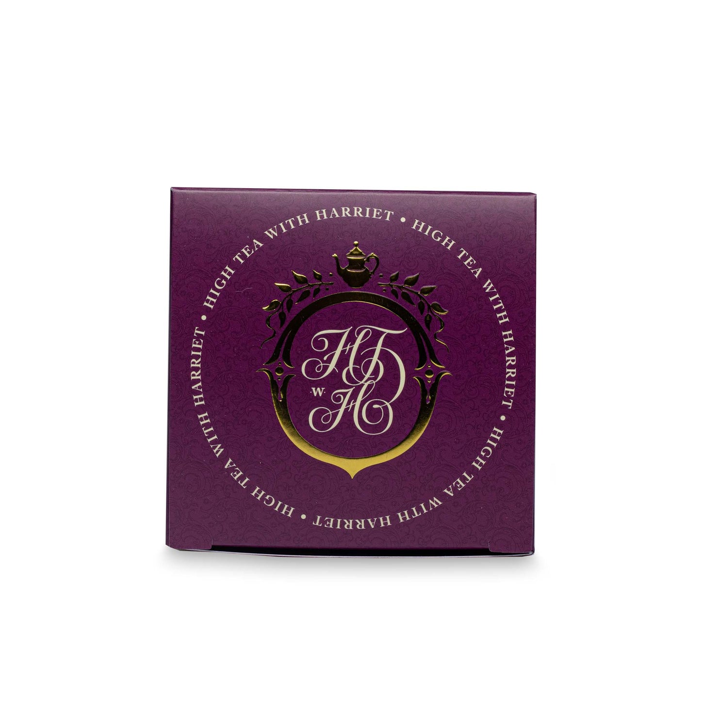 Top view of High Tea with Harriet Birthday Tea box in deep red with gold crest logo