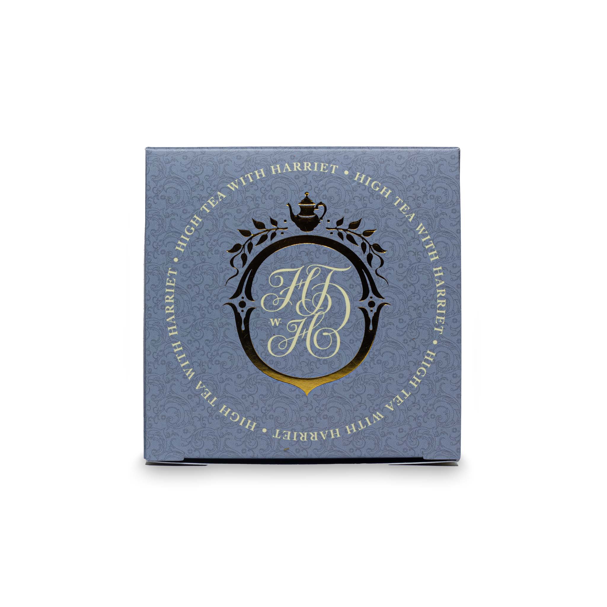 Top view of High Tea with Harriet Earl Grey box in classic blue with monogrammed crest