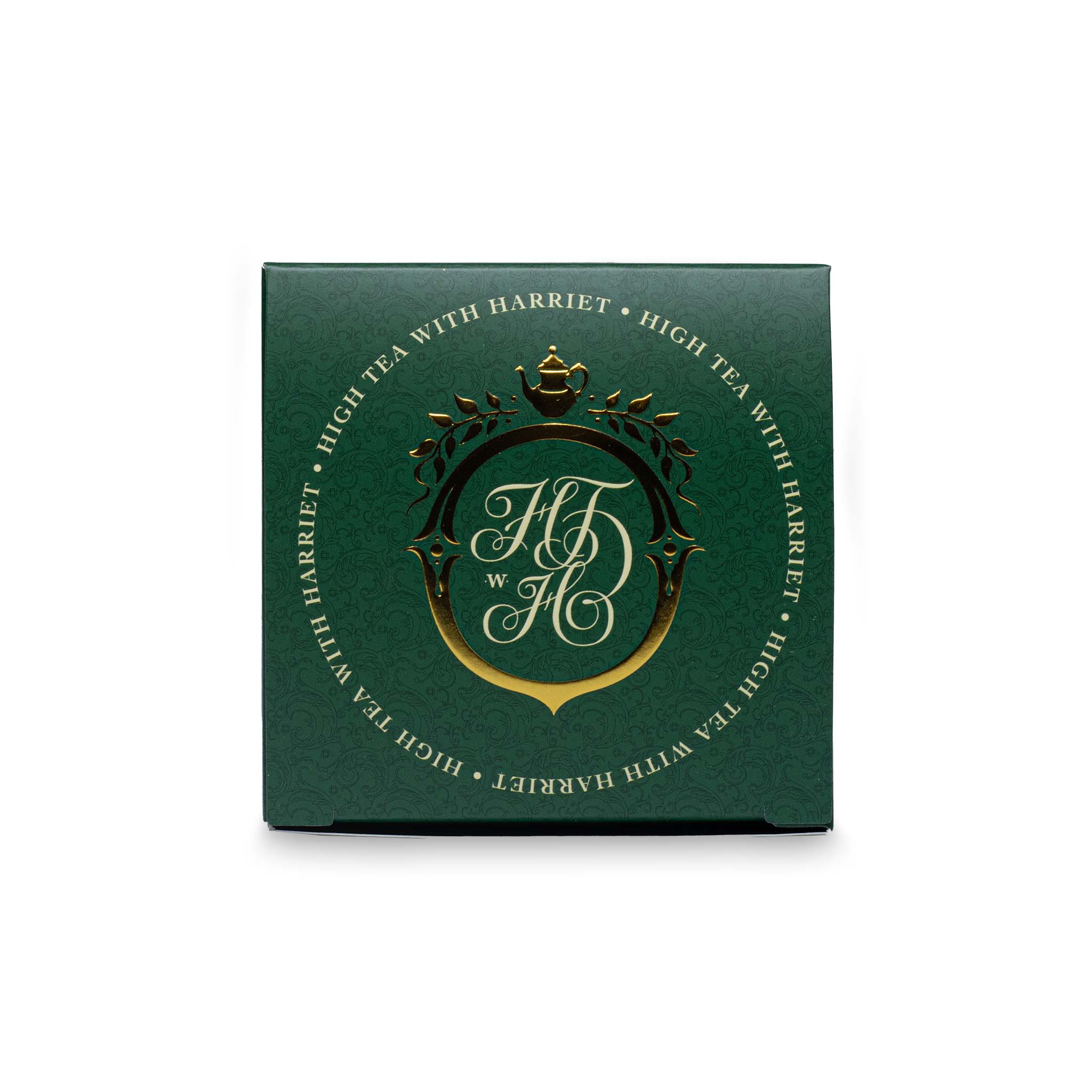 Top view of High Tea with Harriet Elevenses Irish Breakfast box in emerald green with gold crest and branding