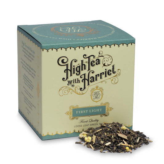 High Tea with Harriet First Light green tea in elegant cream and teal box with loose tea in front
