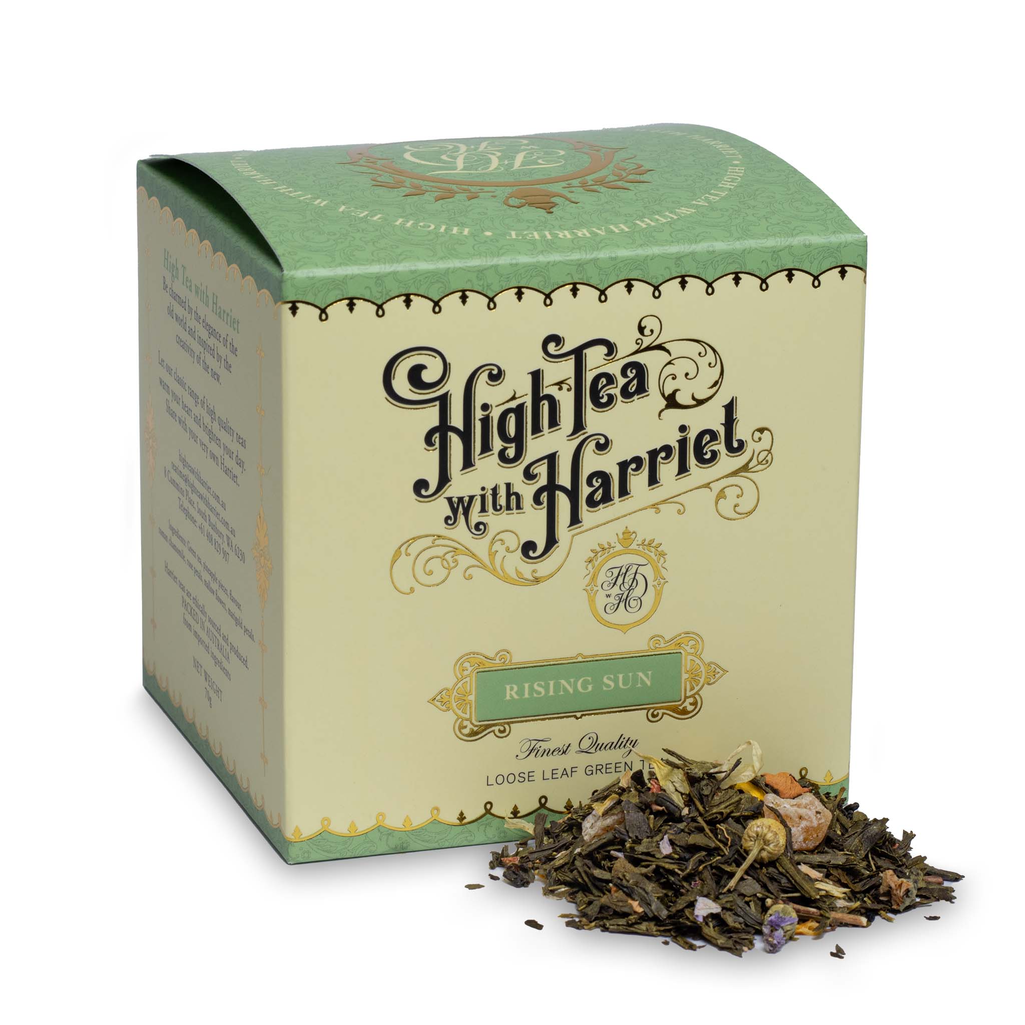High Tea with Harriet Rising Sun tea in pale green and cream box with loose leaf green tea in front featuring pineapple, petals, and chamomile