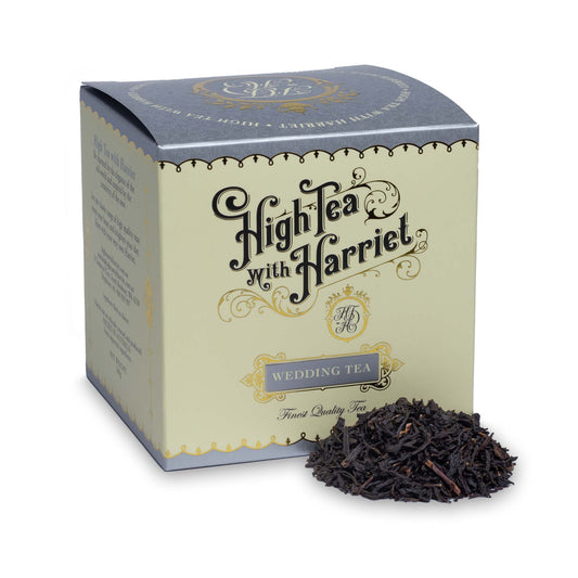 High Tea with Harriet Wedding Tea in elegant cream and silver box with loose Earl Grey Cream tea in front