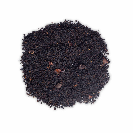 Loose leaf Melbourne Moments black tea by High Tea with Harriet with cacao pieces and caramel notes on white background