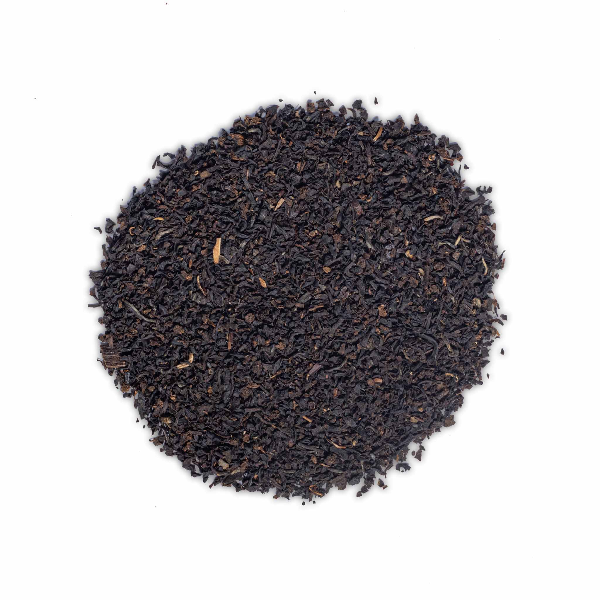 Loose leaf Sunday Tea by High Tea with Harriet featuring finely cut black tea leaves on white background